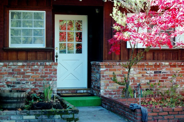 Fachadas de casas pequenas com flores